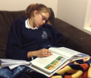 Julia falling asleep over homework