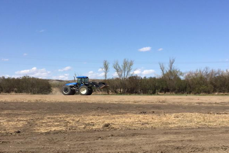 tractor in dirt field